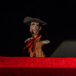Foto do boneco tradicional gaúcho em cena